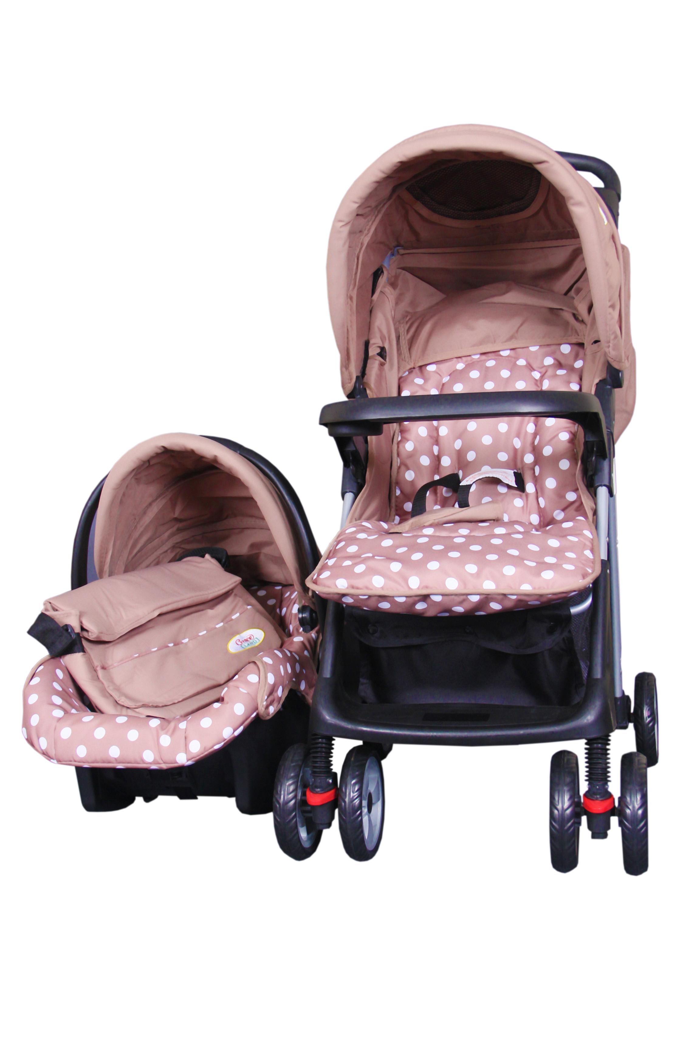 A folded 2-in-1 baby stroller with a detachable carry cot