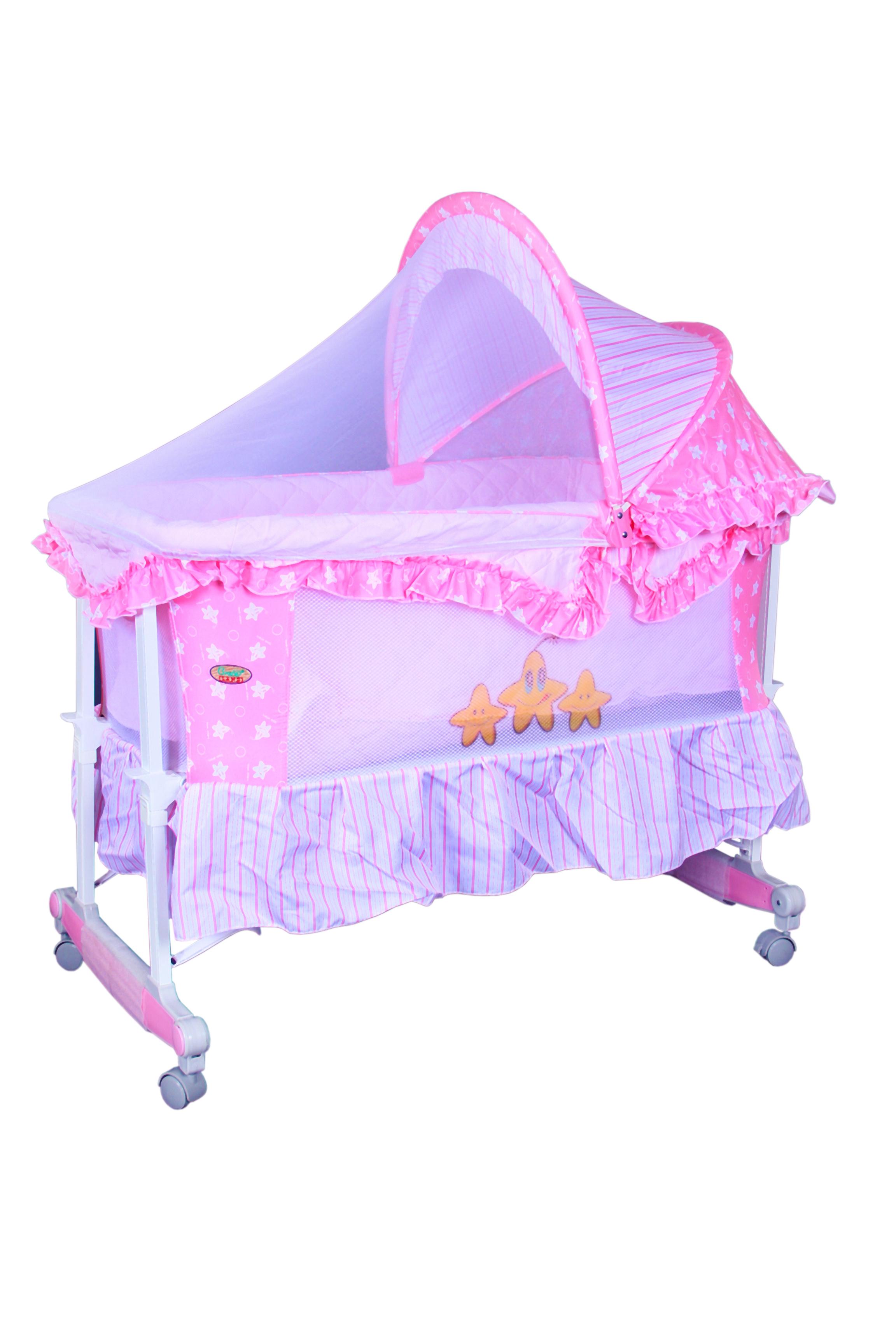 A pink baby cot with net sides and a mosquito net cover